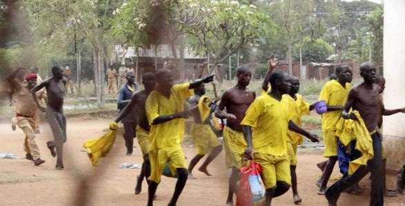 Uganda jail break: More than 200 prisoners escape, some with guns and  ammunition