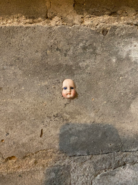 doll stuck basement
