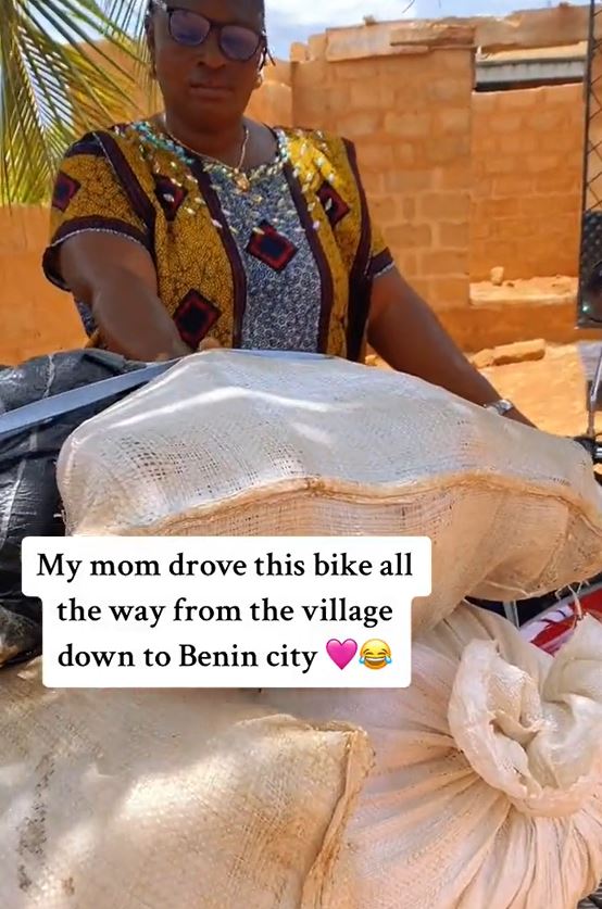 Lady Expresses Sh0ck As Her Mother Travels By Bike To Deliver Food To Her In Benin City (WATCH)